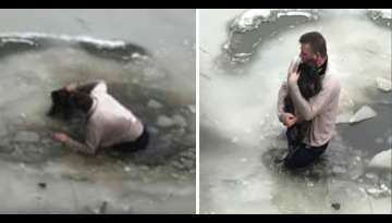 Man jumps into icy water to save dog from drowning in park